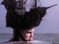 Giant man with a boat on his head