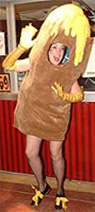 Girl Eating a Corndog: Yes, this woman is dressed like a corndog.