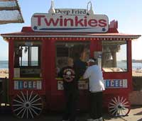 Girl Eating a Corndog: Deep Fried Twinkies